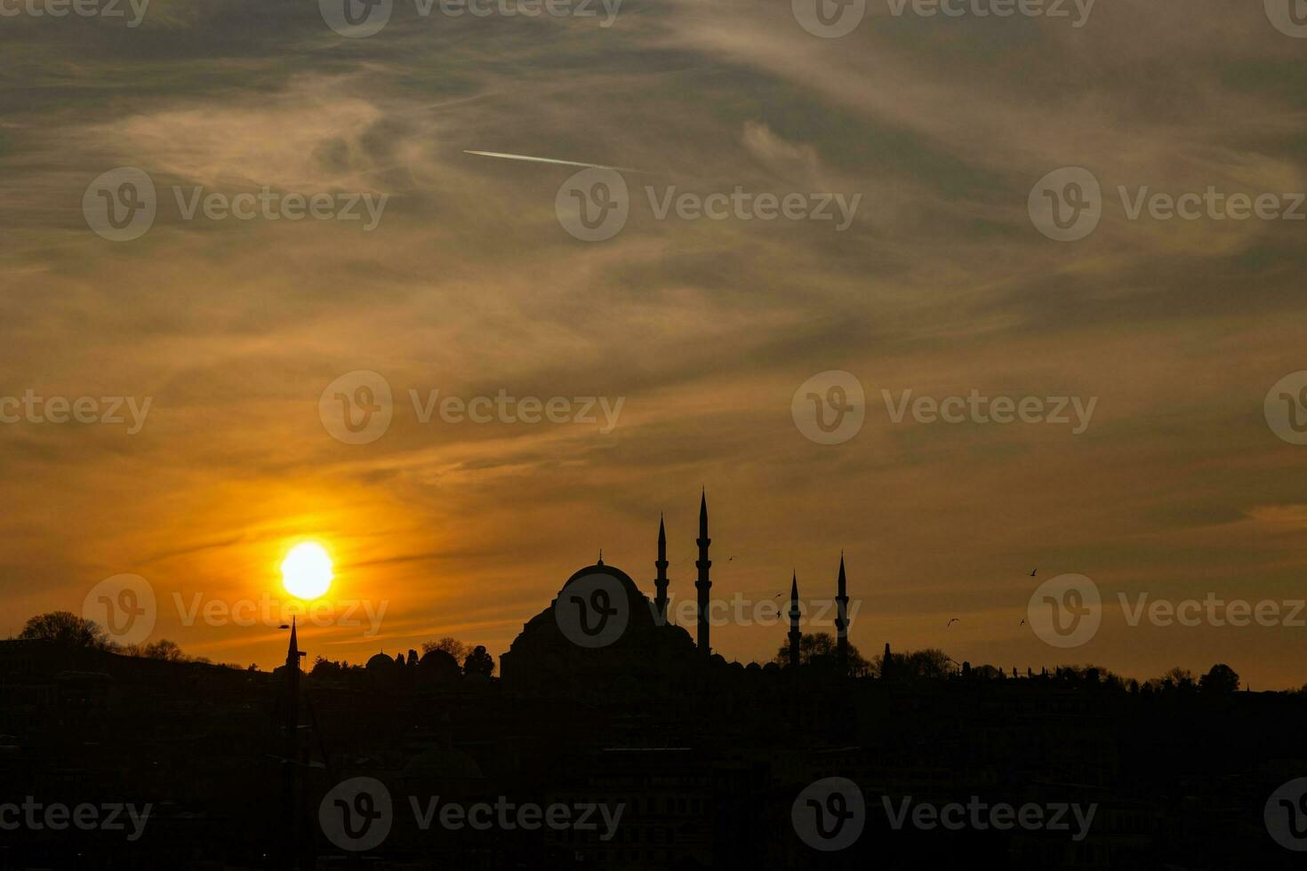 Suleymaniye Mosque at sunset. Istanbul silhouette. Ramadan or islamic concept photo