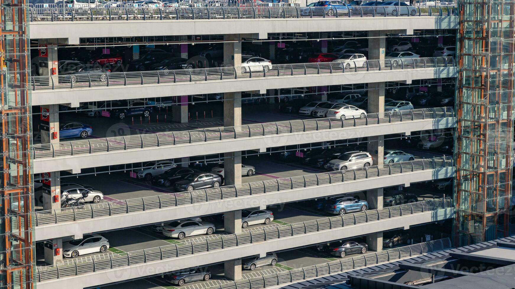 Multi-story car park building with cars photo