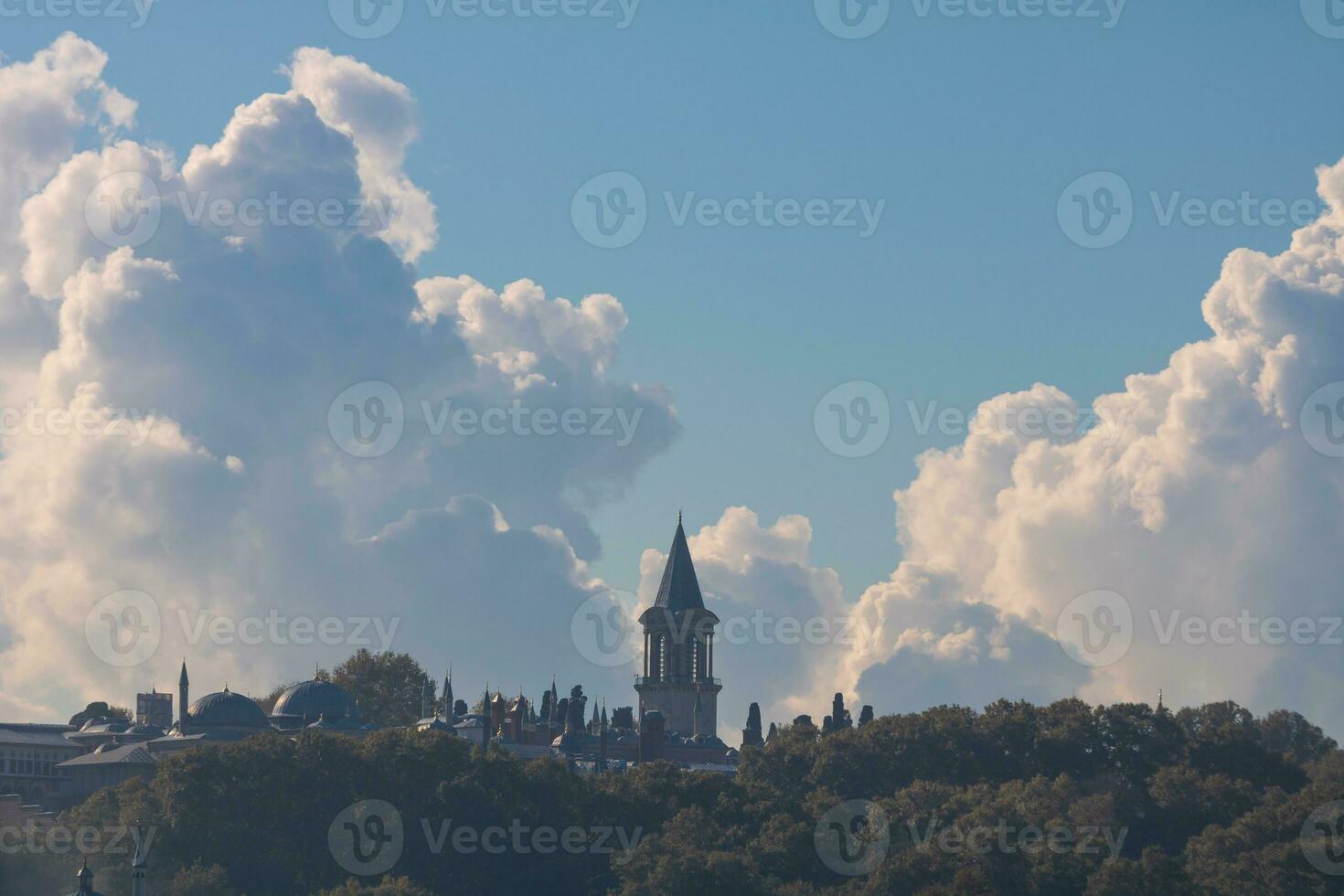 Topkapi Palace with amazing clouds on the background photo