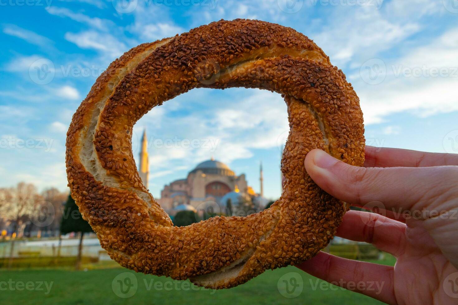 Simit or Turkish Bagel with Hagia Sophia. Travel to Istanbul concept photo