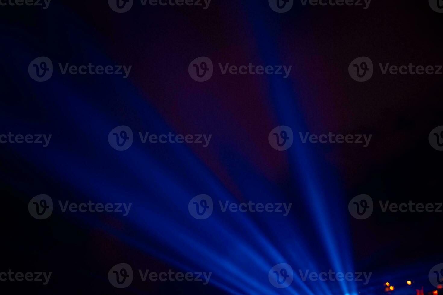 Blue spotlight rays. Projector light rays background photo