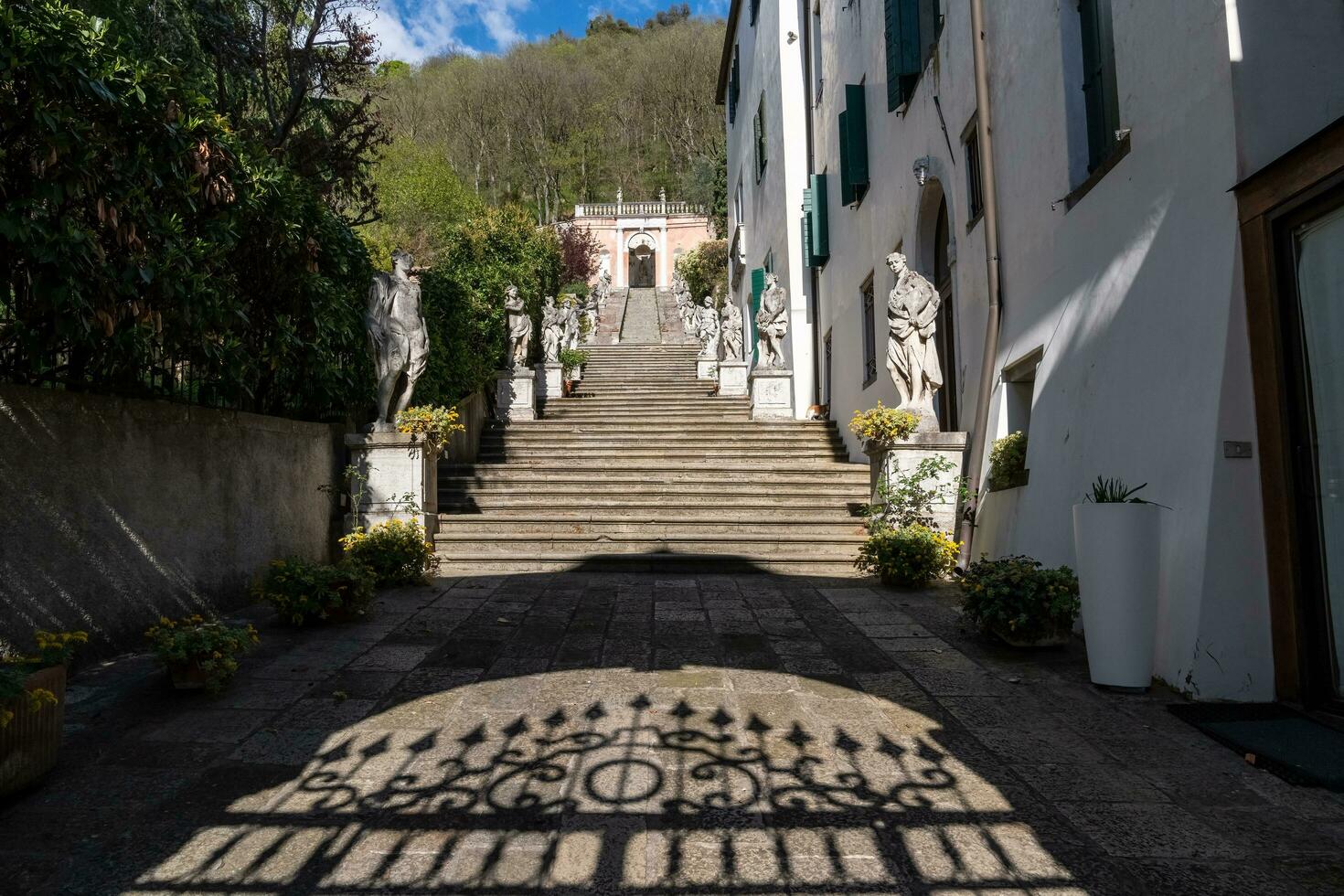 Monselice, Italy-April 16, 2023-View of the staircase of the historic villa on the sanctuary road in Monselice during a sunny day photo