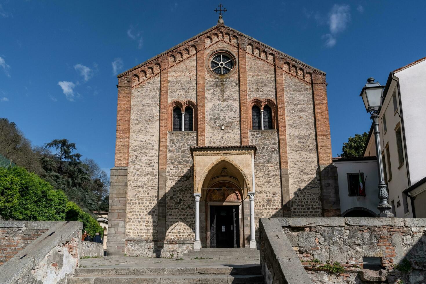 Monselice, Italy-April 16, 2023-View of the Parish Church of Santa Giustina on the sanctuary road in Monselice during a sunny day photo