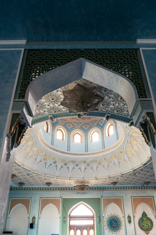 Tashkent, Uzbekistan-august 11, 2023-Inside of the Khazrati Imam Mosque in the Hazrati Imam complex during a sunny day.The complex is a square that includes a set of religious buildings in Tashkent photo