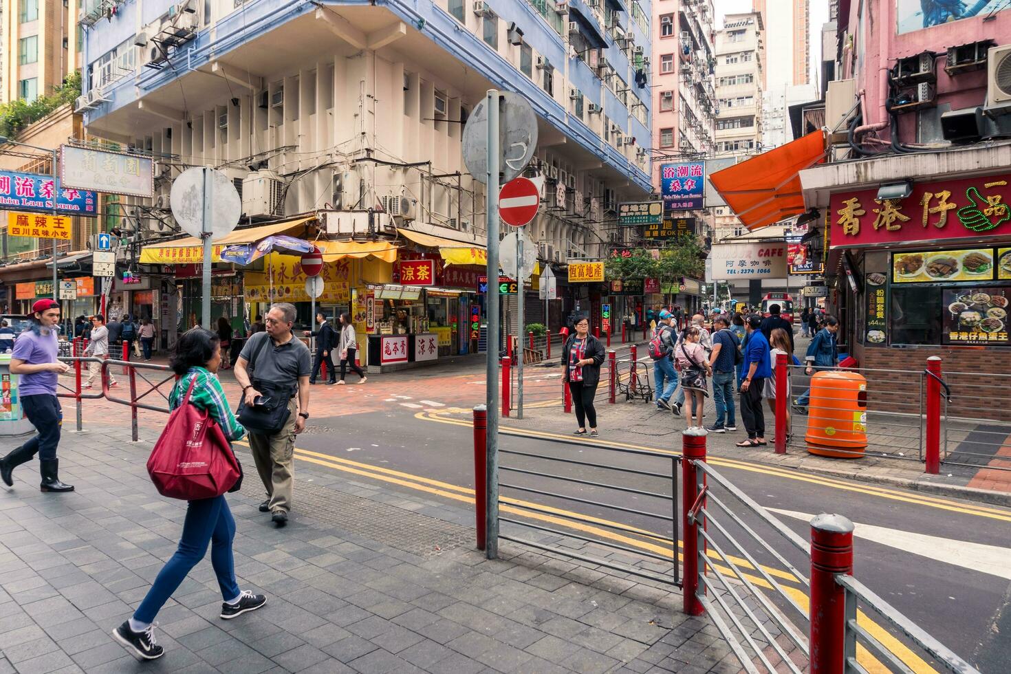 Hong Kong,March 26,2019-Daily life in the streets and skyscrapers of Hong Kong during a cloudy day photo