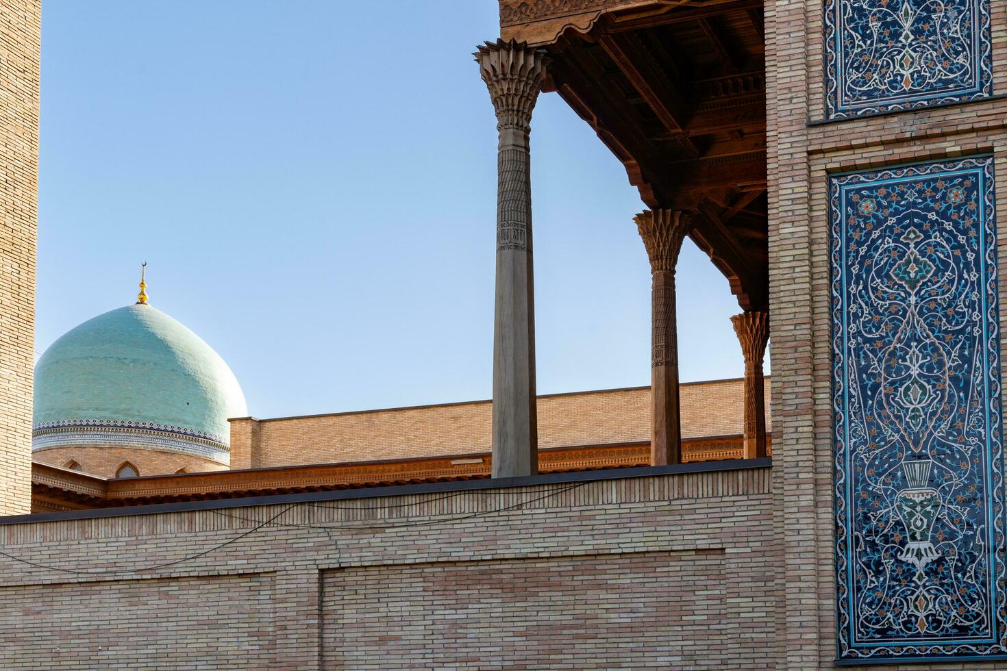 Tashkent, Uzbekistan-august 11, 2023-Khazrati Imam Mosque in the Hazrati Imam complex during a sunny day.The complex is a square that includes a set of religious buildings in Tashkent photo
