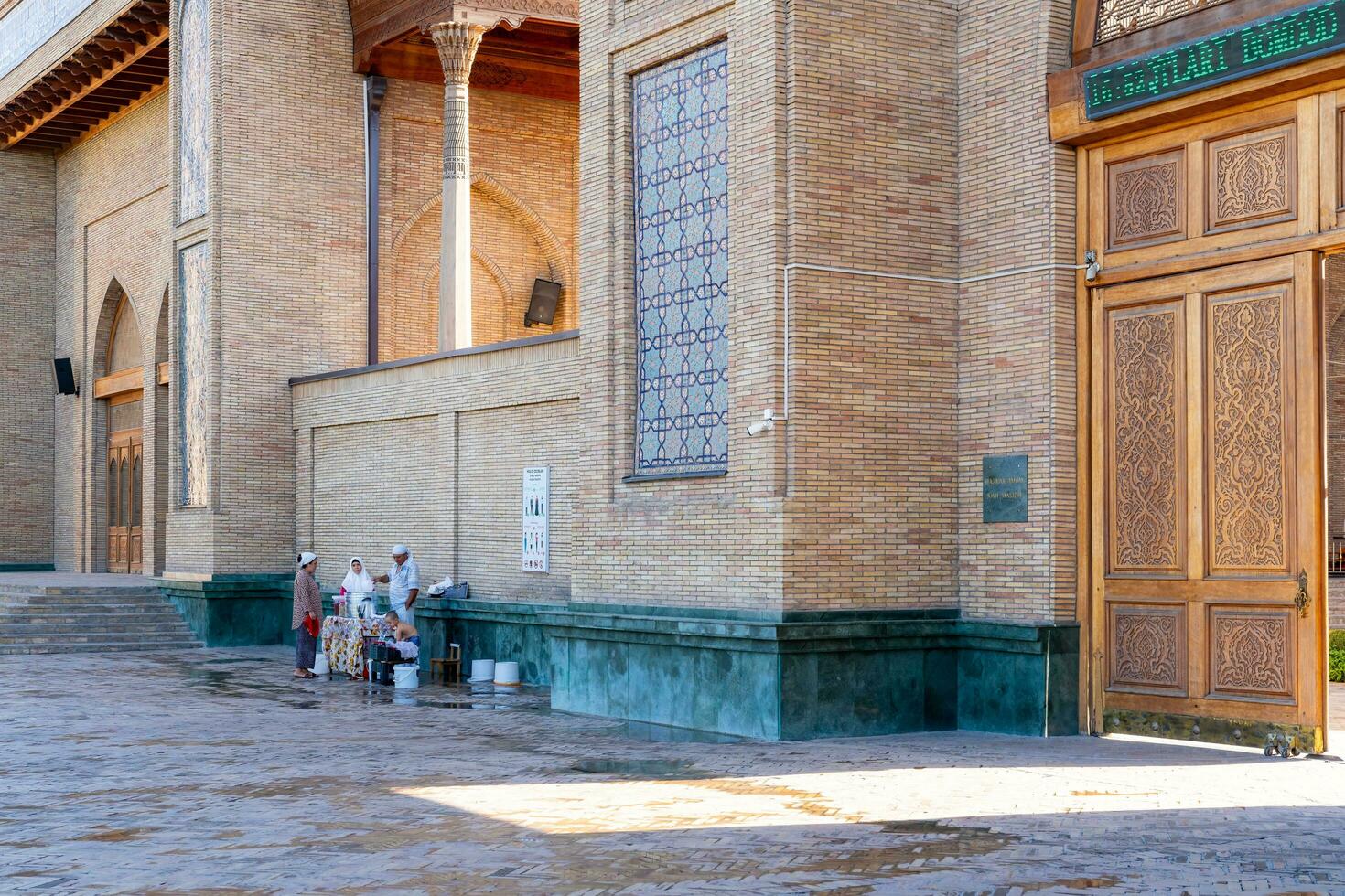 Tashkent, Uzbekistan-august 11, 2023-Khazrati Imam Mosque in the Hazrati Imam complex during a sunny day.The complex is a square that includes a set of religious buildings in Tashkent photo