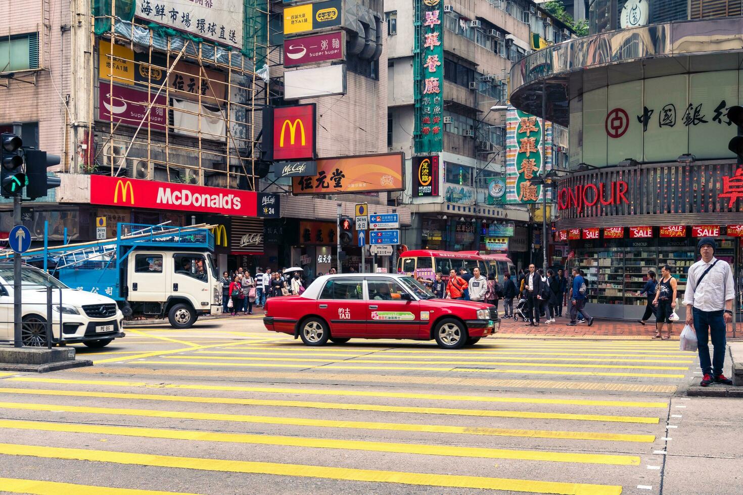 Hong Kong,March 26,2019-Daily life in the streets and skyscrapers of Hong Kong during a cloudy day photo