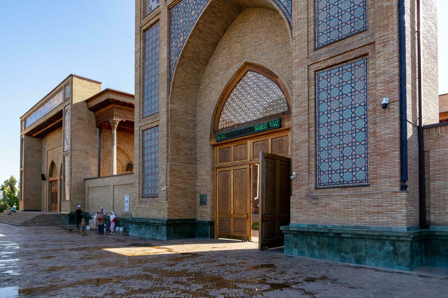 Tashkent, Uzbekistan-august 11, 2023-Khazrati Imam Mosque in the Hazrati Imam complex during a sunny day.The complex is a square that includes a set of religious buildings in Tashkent photo