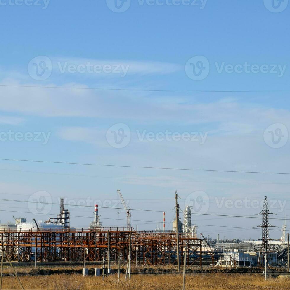 Distillation columns, pipes and other equipment furnaces refinery. photo