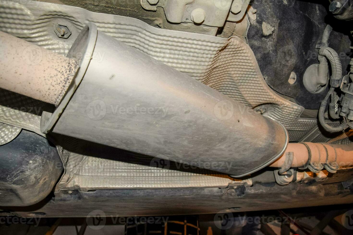 Exhaust system of the car. The muffler of exhaust gases. photo