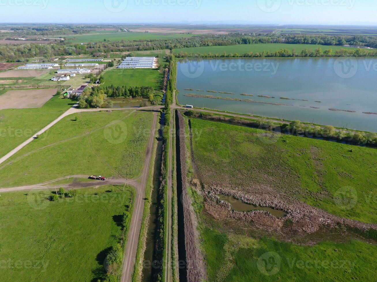 Rural landscape. View from above. On the horizon there is a fish
