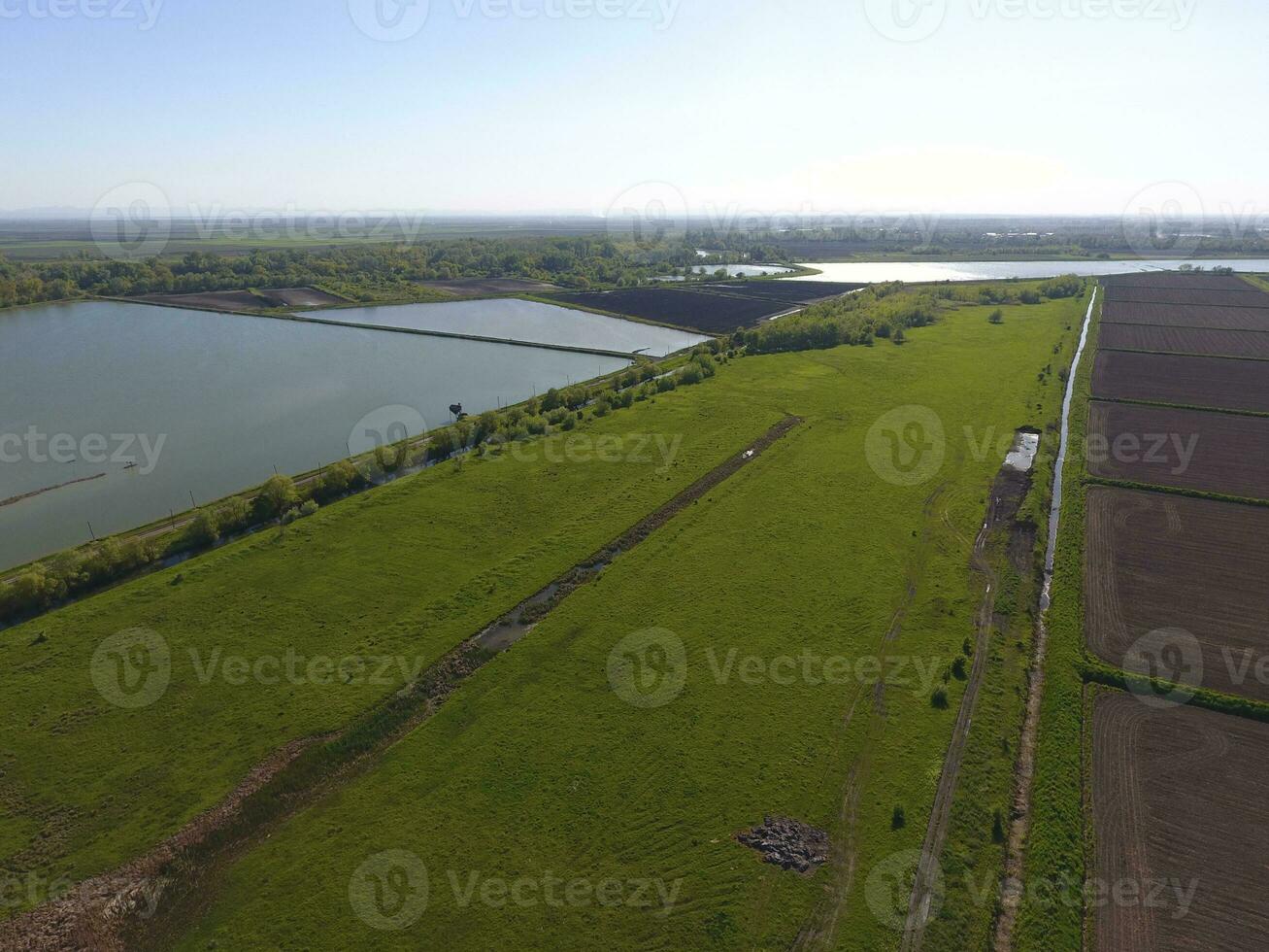 Rural landscape. View from above. On the horizon there is a fish