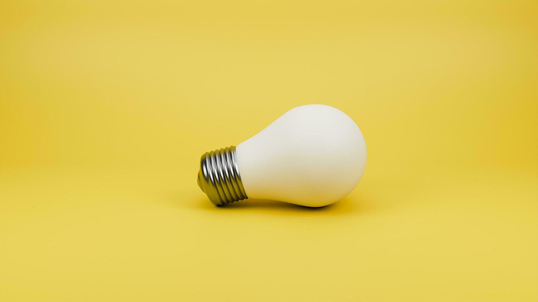White LED bulb isolated and place on plain yellow background photo
