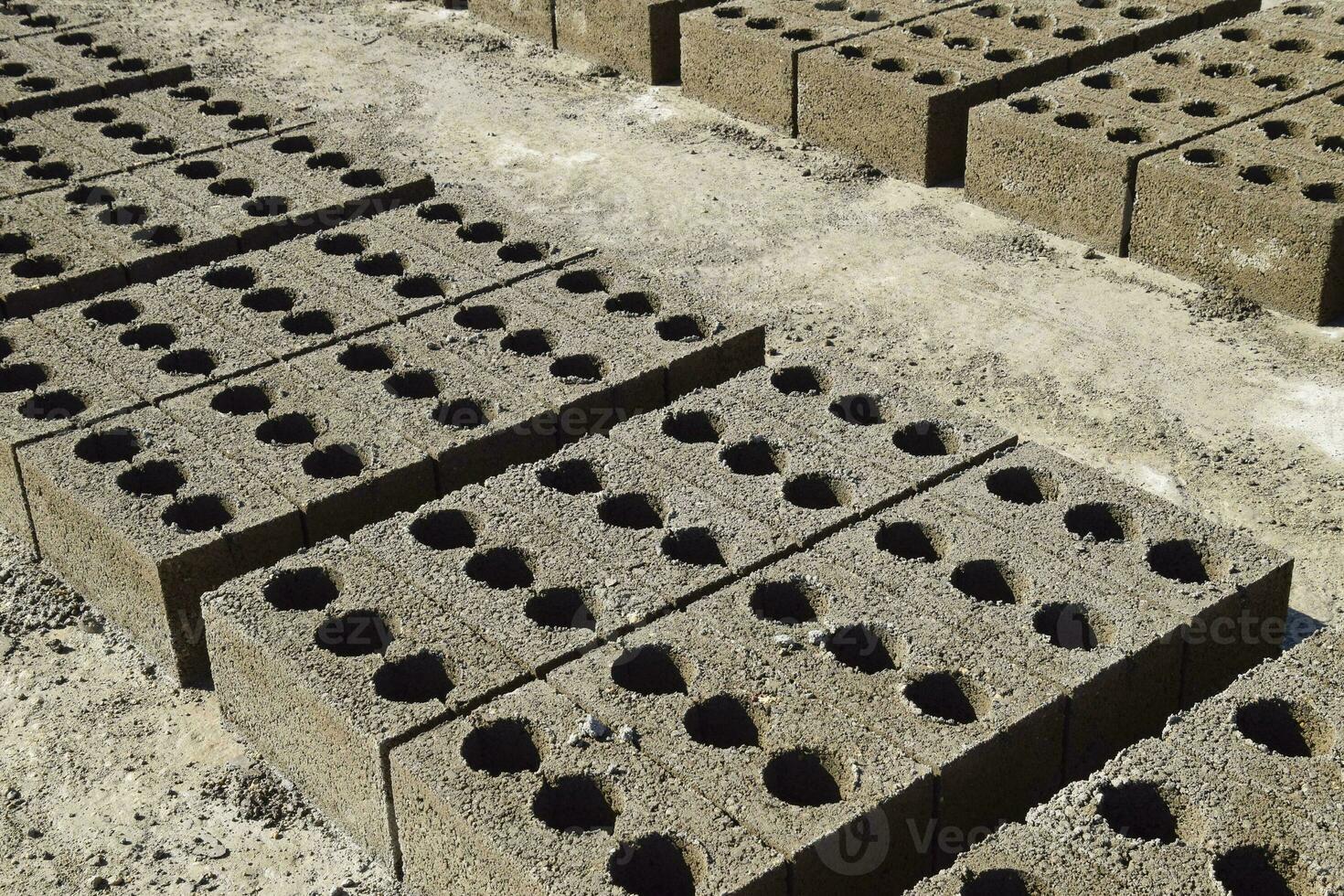 Cinder blocks lie on the ground and dried. on cinder block produ photo