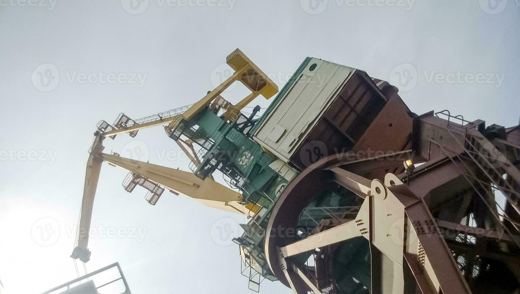 View from the top to the top of the port tower crane. Industrial port photo
