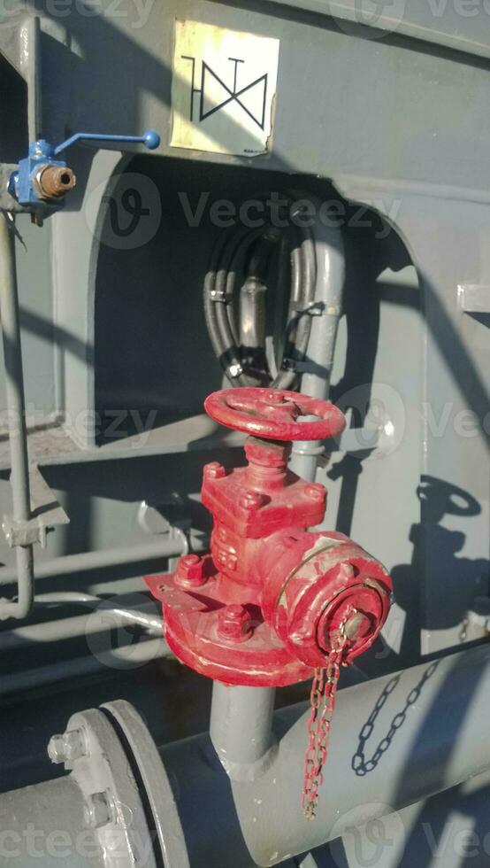 Manual shut-off valve of the outlet pipe of the water supply line of the fire-fighting system photo