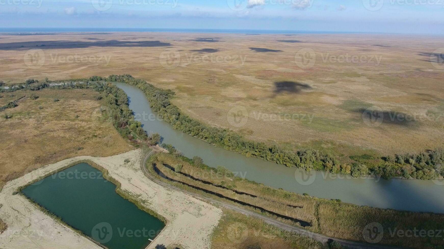 Landscape near the Sea of Azov, the river, an artificial lake and open spaces for hunting and fishing photo