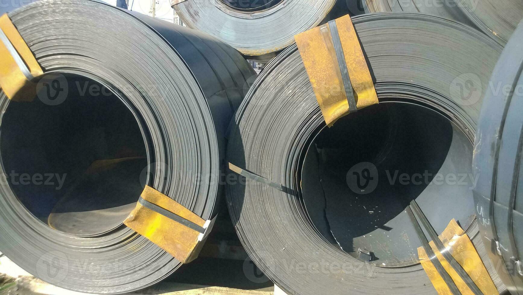 Steel sheets rolled up into rolls. Export Steel. Packing of stee photo