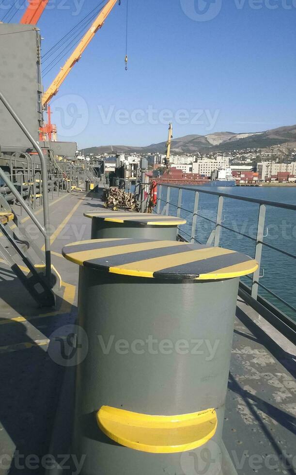 Mooring bollard on the decks of an industrial seaport. photo