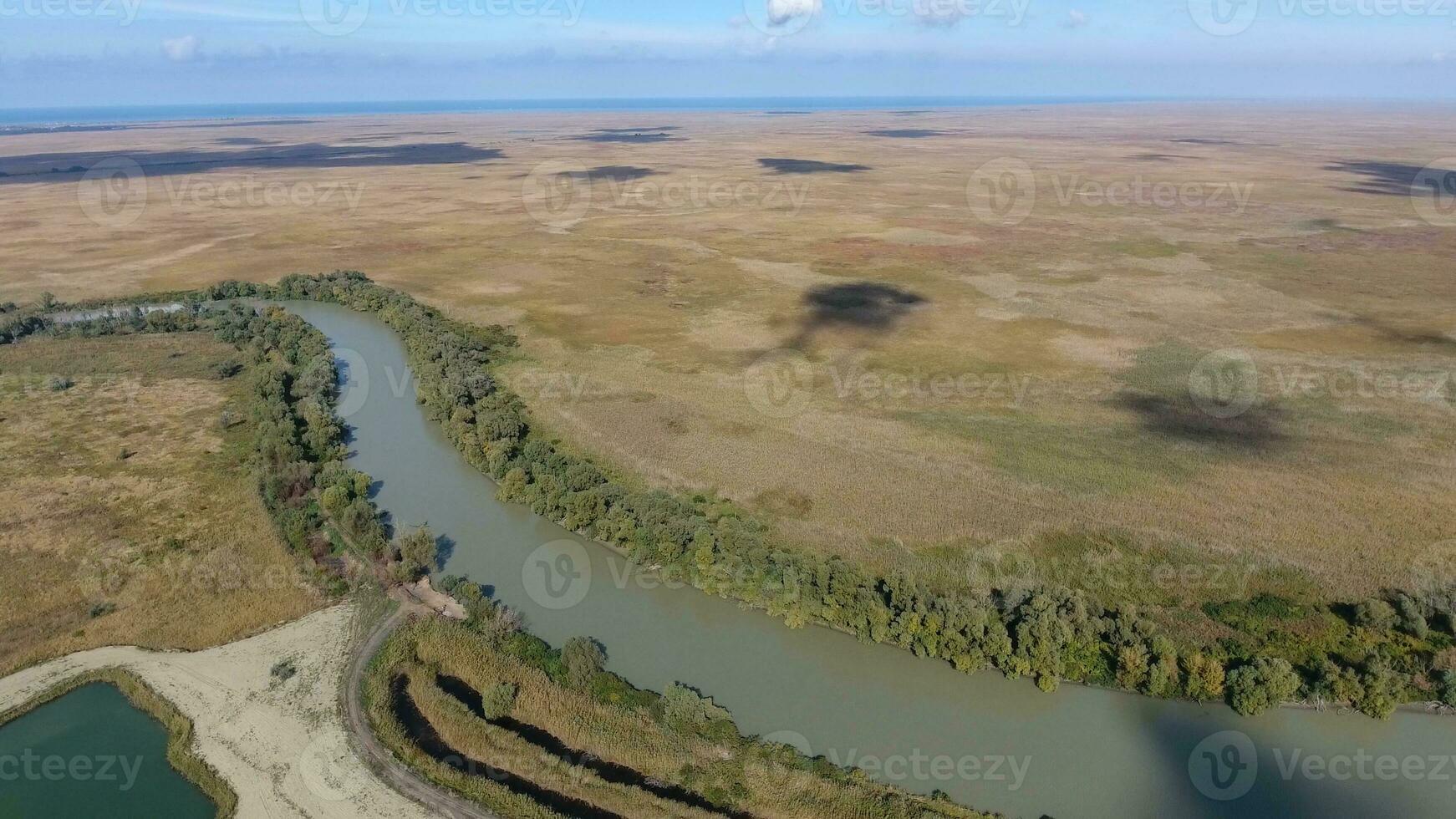 Landscape near the Sea of Azov, the river, an artificial lake and open spaces for hunting and fishing photo