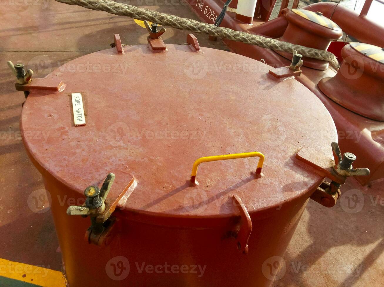 The hatch in the ventilation on the deck of the ship. Locks on the hatch photo