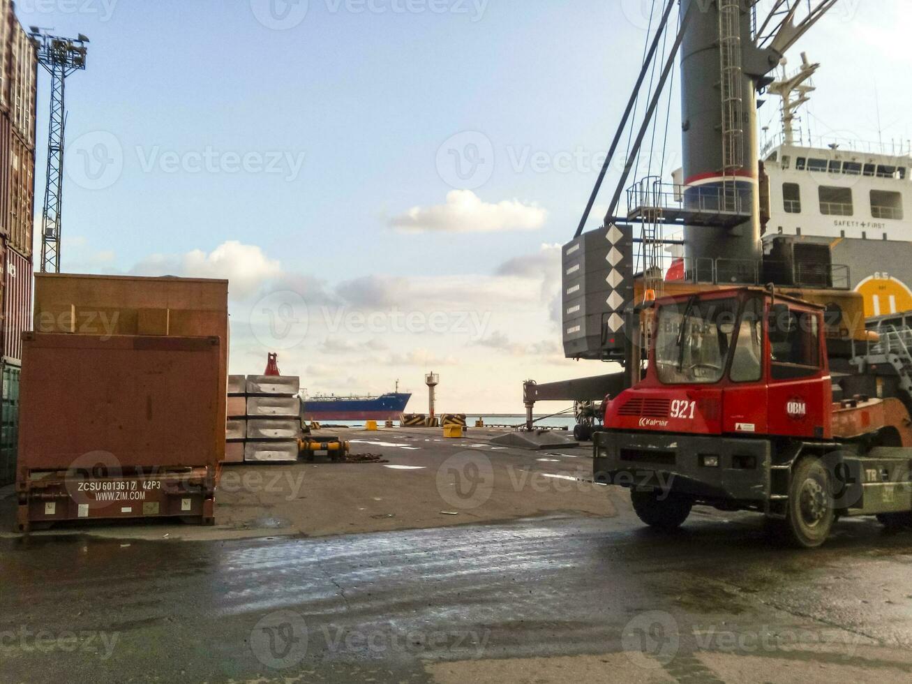 The port loader in the port drives around the site. photo
