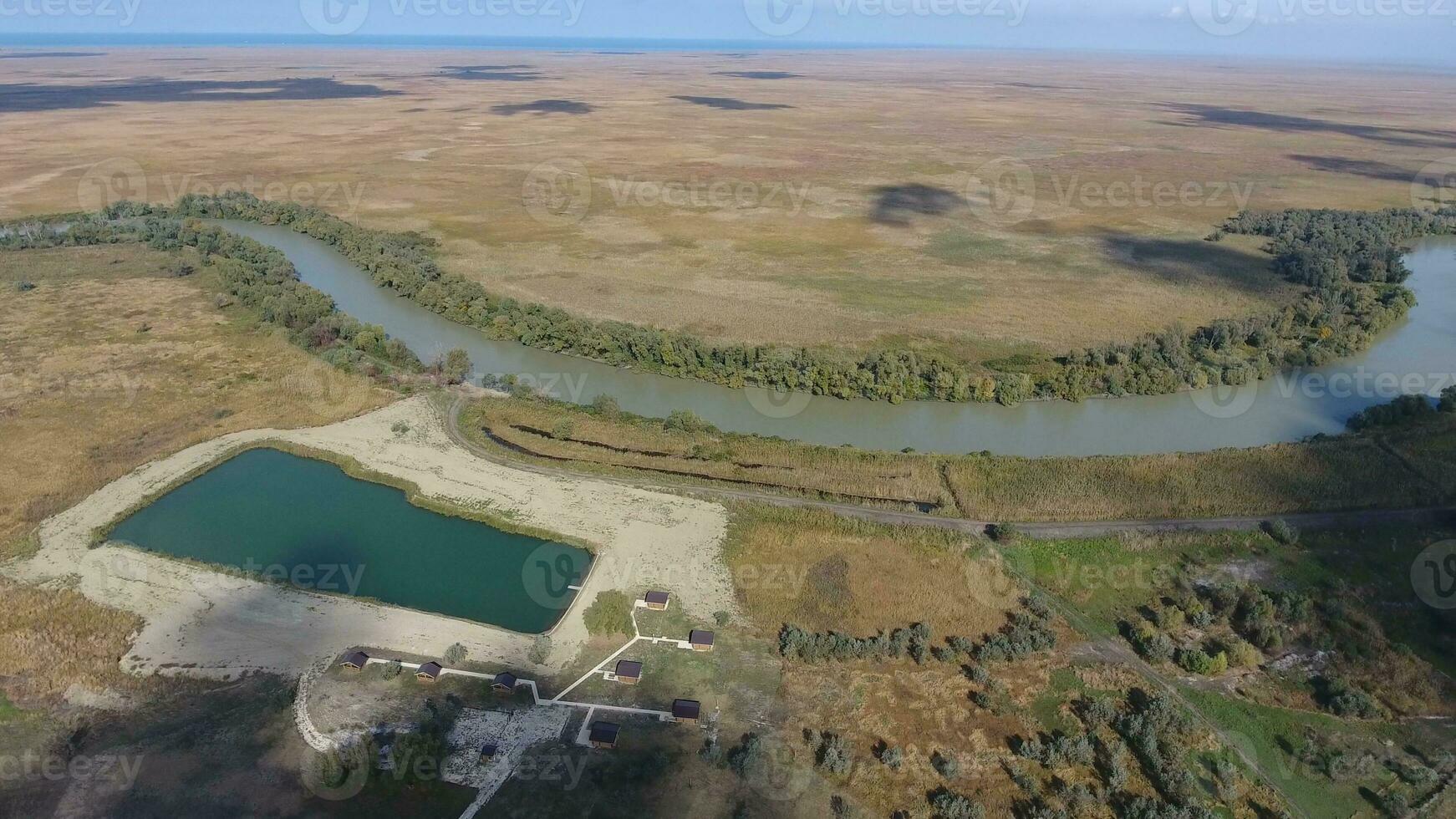 Landscape near the Sea of Azov, the river, an artificial lake and open spaces for hunting and fishing photo
