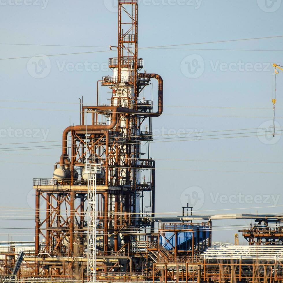 The column of deep processing of fuel oil. A furnace for heating fuel oil. Processing of fuel oil. Oil refining. photo