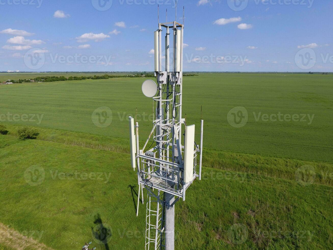 Cellular tower. Equipment for relaying cellular and mobile signa photo