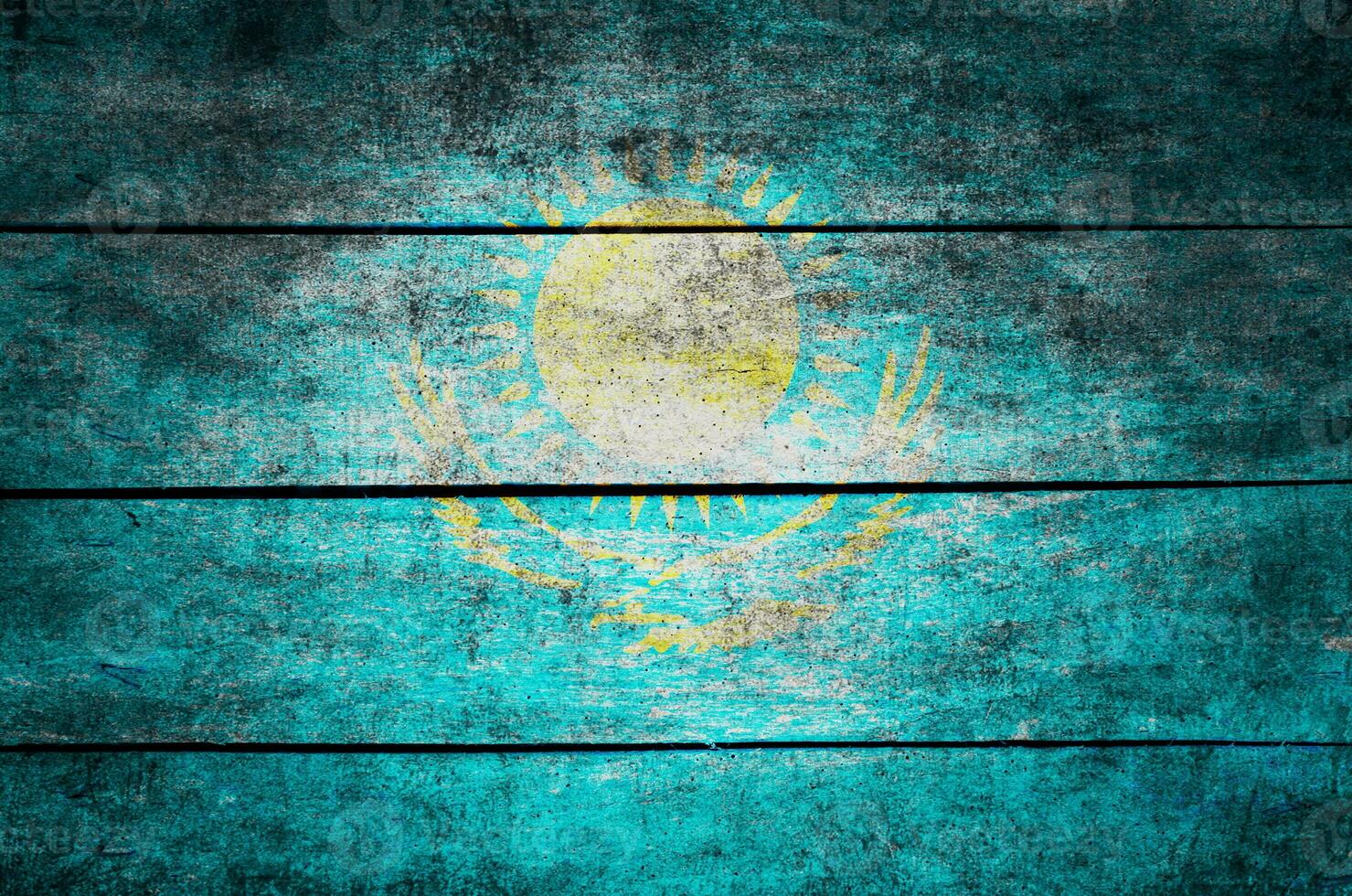 wooden texture surface with old painted flag photo