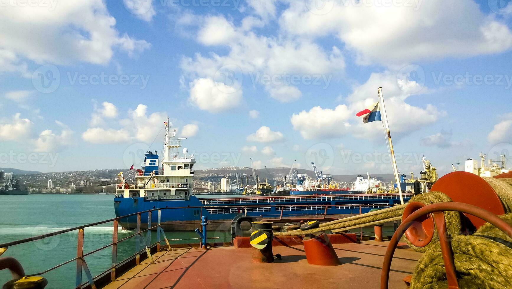 Mechanisms of tension control ropes. Winches. Equipment on the deck of a cargo ship or port photo