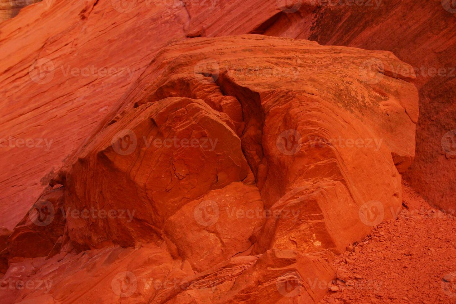 Detail patterns and cracks in Red Navajo sandstone walls photo