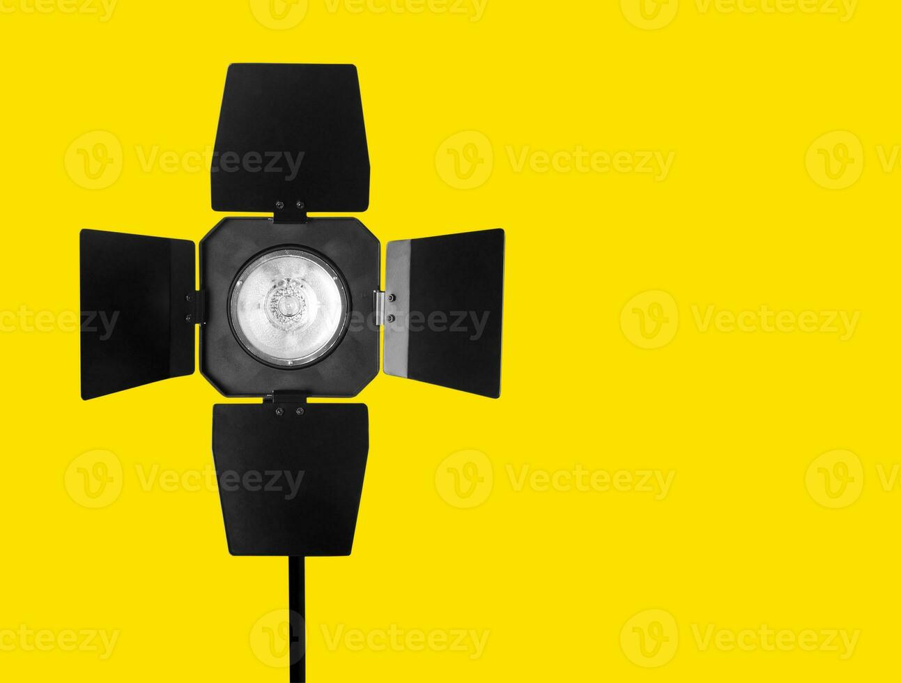 Studio strobe flash on the yellow photo