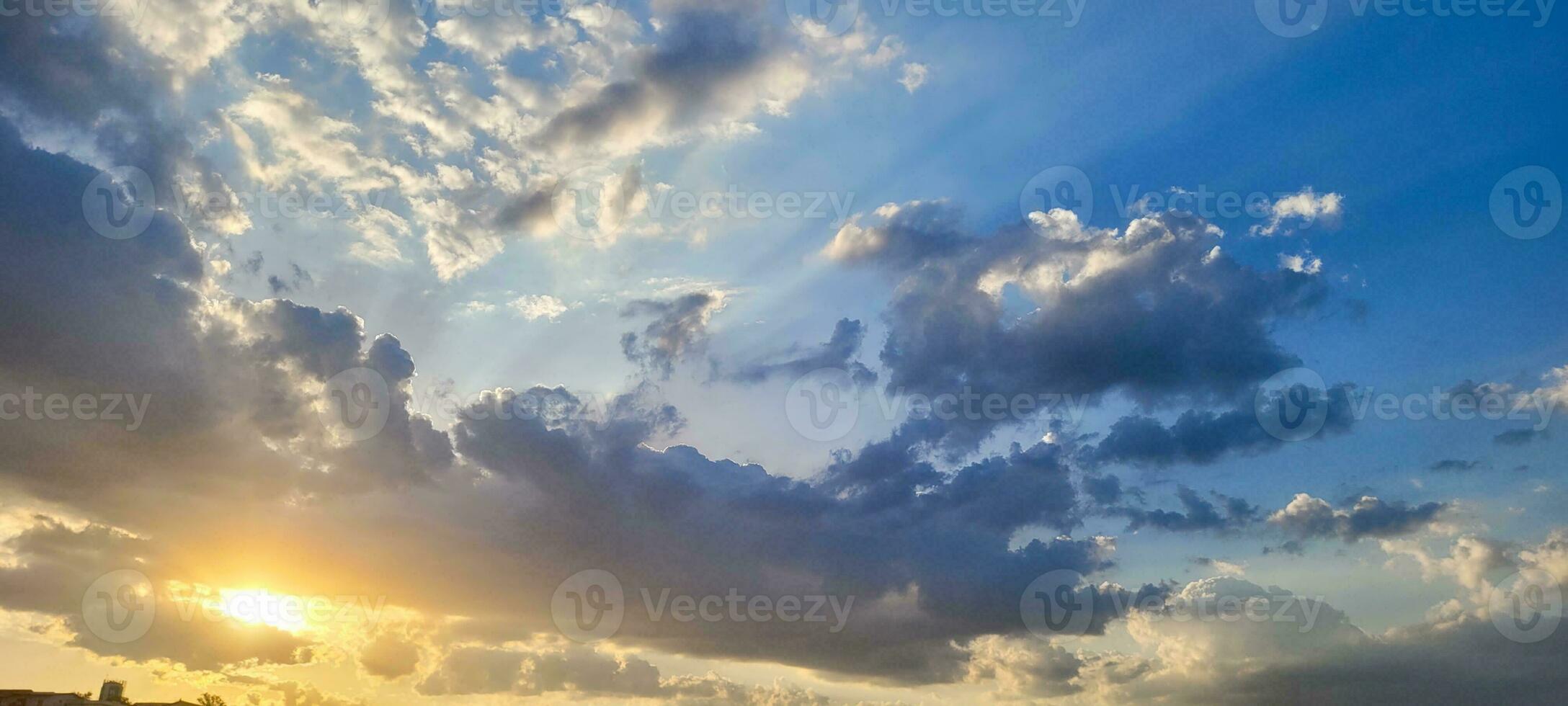 Clear and serene sky, soft clouds painting a celestial picture. The tranquil beauty of the atmosphere to enhance your projects. Purchase this celestial image to inspire and captivate. photo