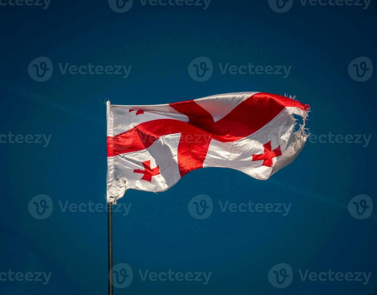 Flag of Georgia waving closeup photo