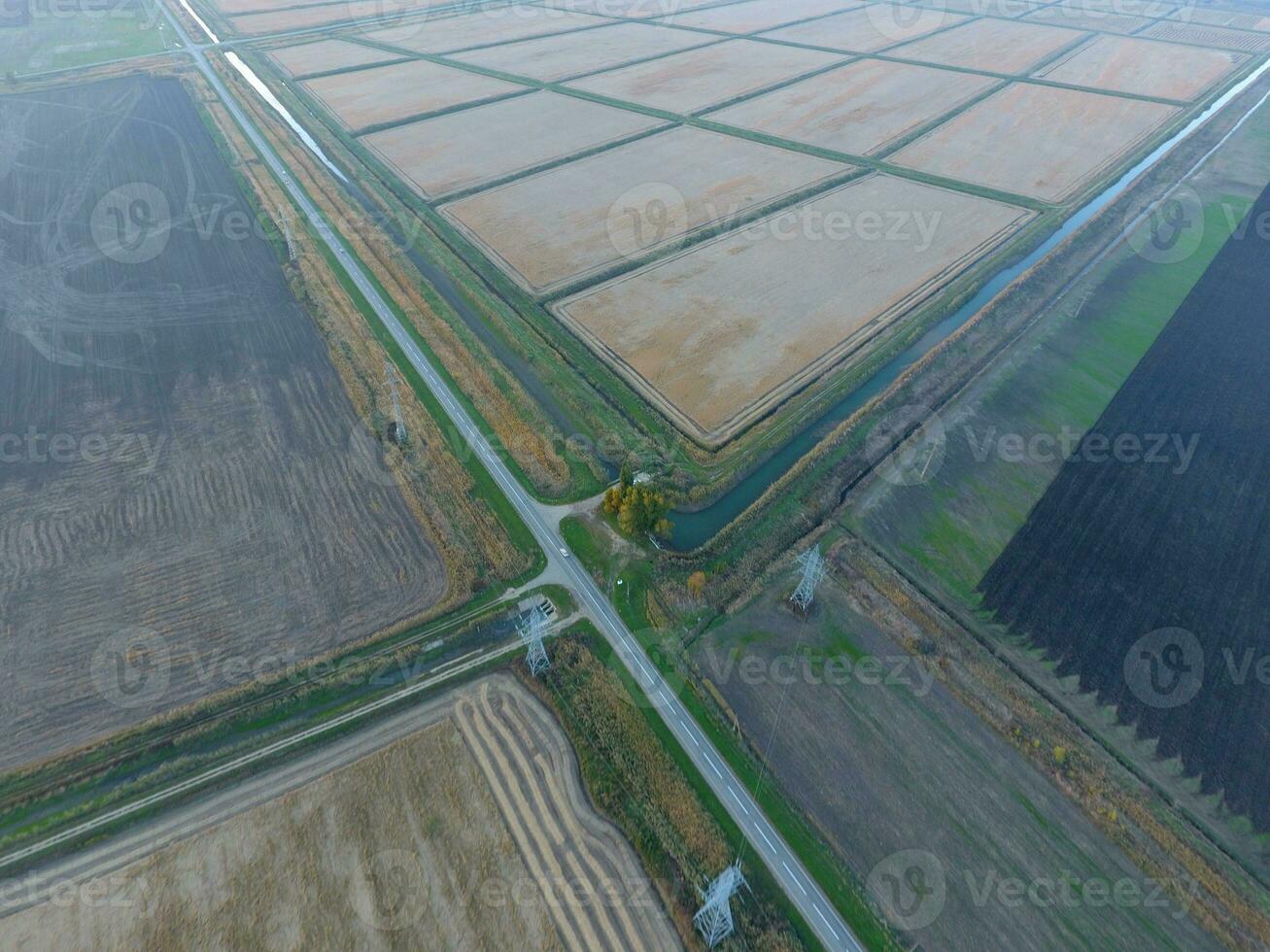 Crossroads paved roads through the fields. View from above photo