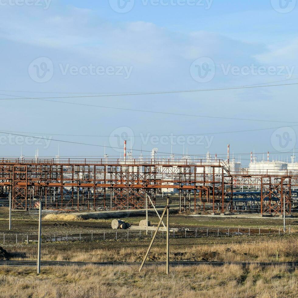 Distillation columns, pipes and other equipment furnaces refinery. photo