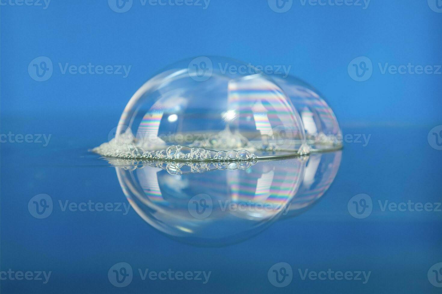 Blue blurry background from water bubbles photo