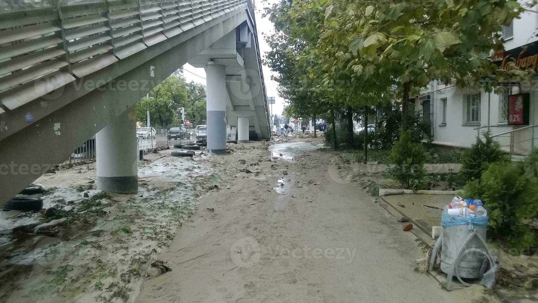 Consequences of the strongest downpour in the city of Novorossiysk. Riot of the elements. Mud deposits on the streets. photo