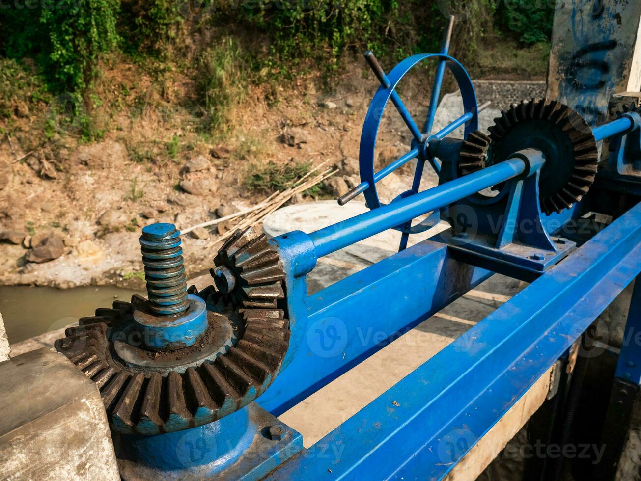 gear system to regulate river water flow for irrigation photo