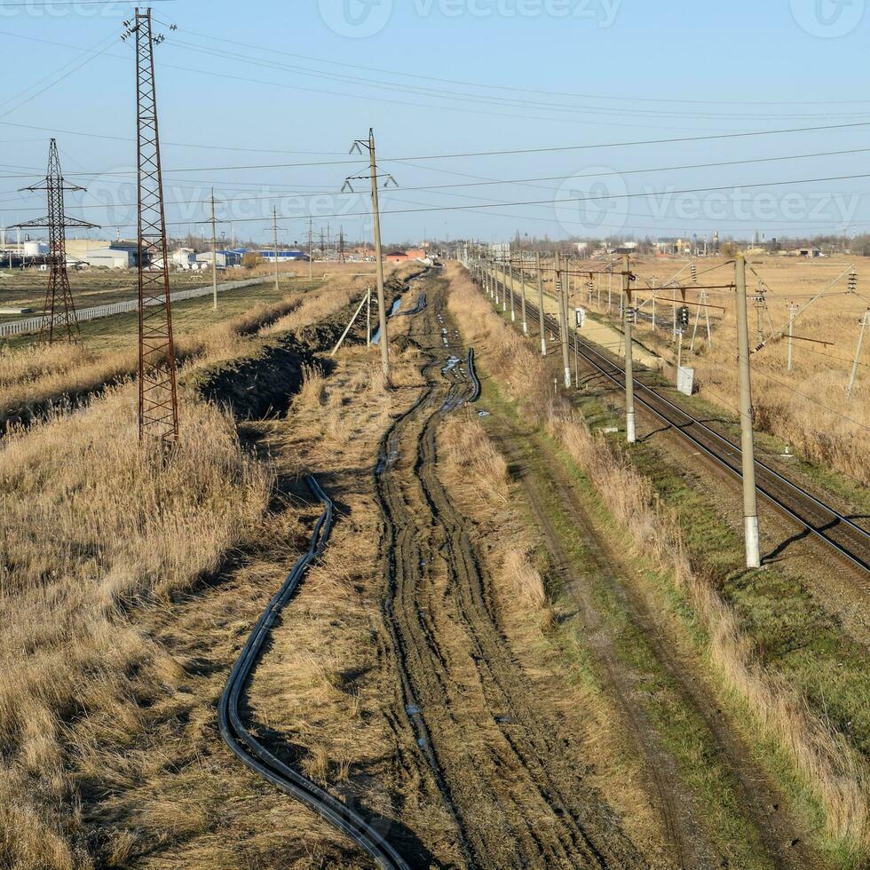 Plot railway. Top view on the rails. High-voltage power lines for electric trains photo