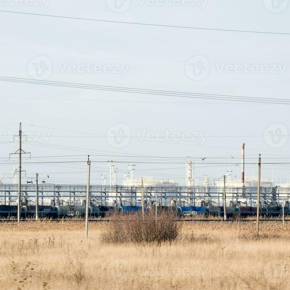 Distillation columns, pipes and other equipment furnaces refinery. photo