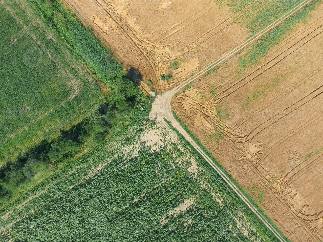 Crossroads paved roads through the fields. View from above photo