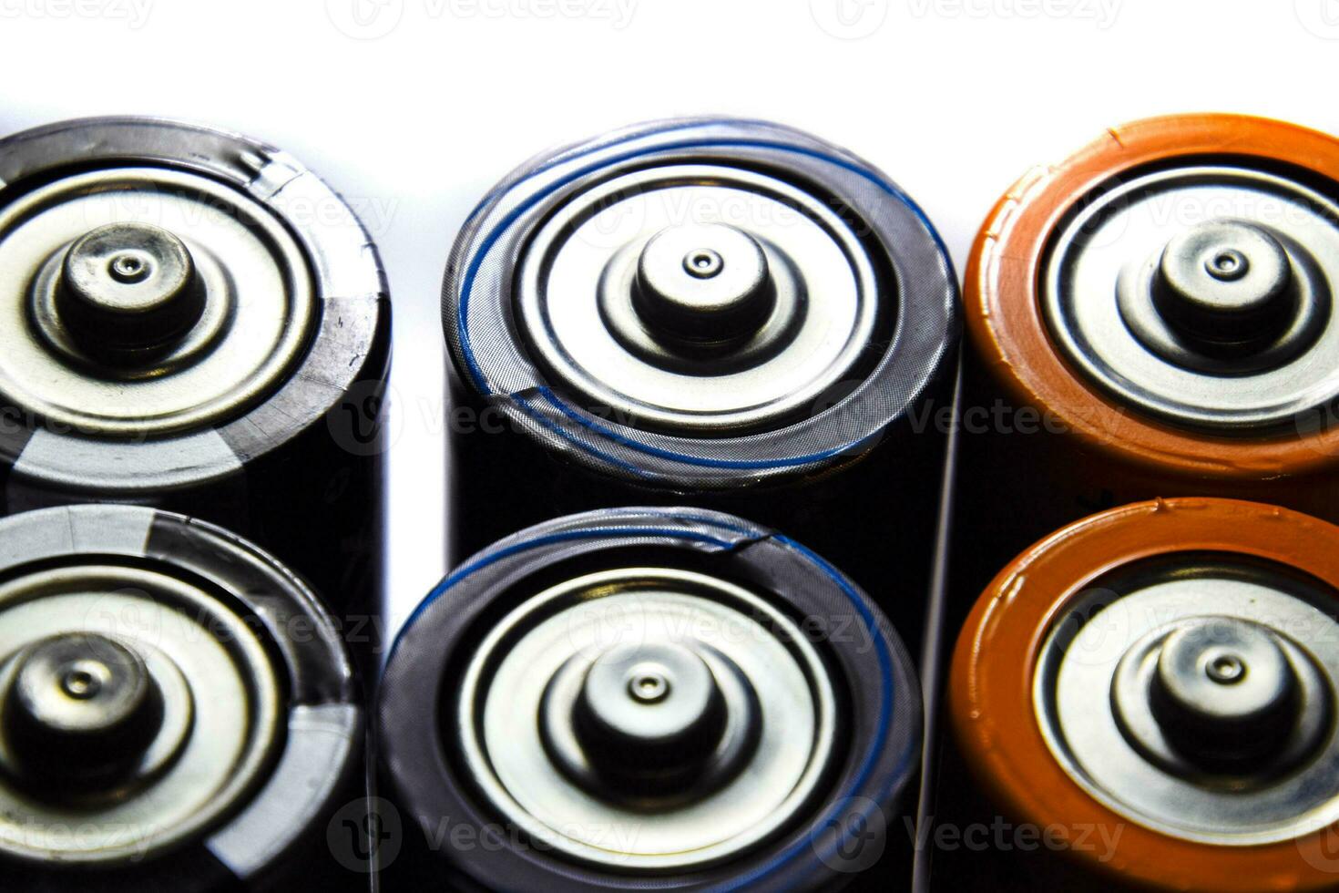 Salt and alkaline batteries, source of energy for portable technology. AAA and AA batteries photo