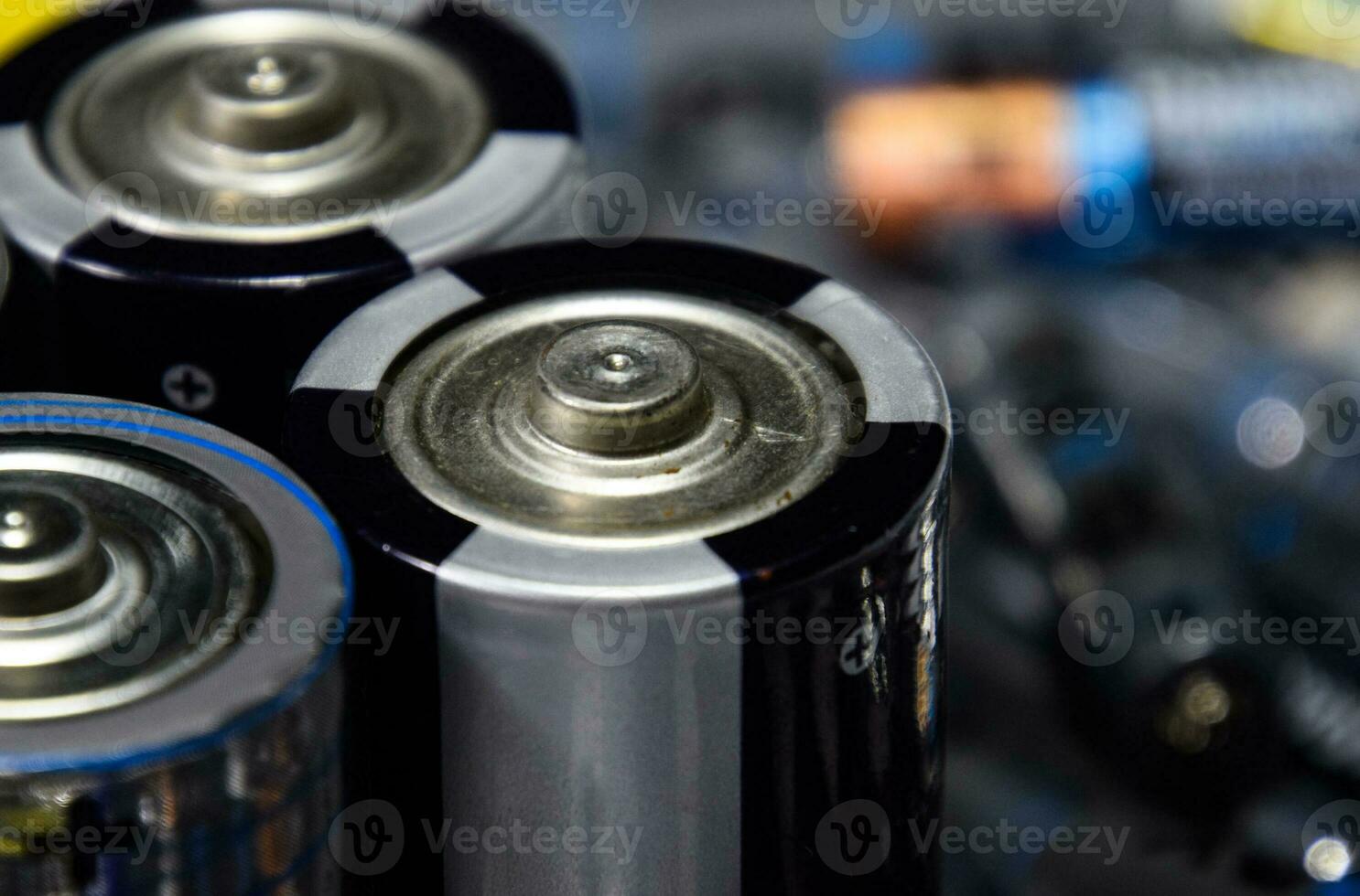 Salt and alkaline batteries, source of energy for portable technology. AAA and AA batteries photo