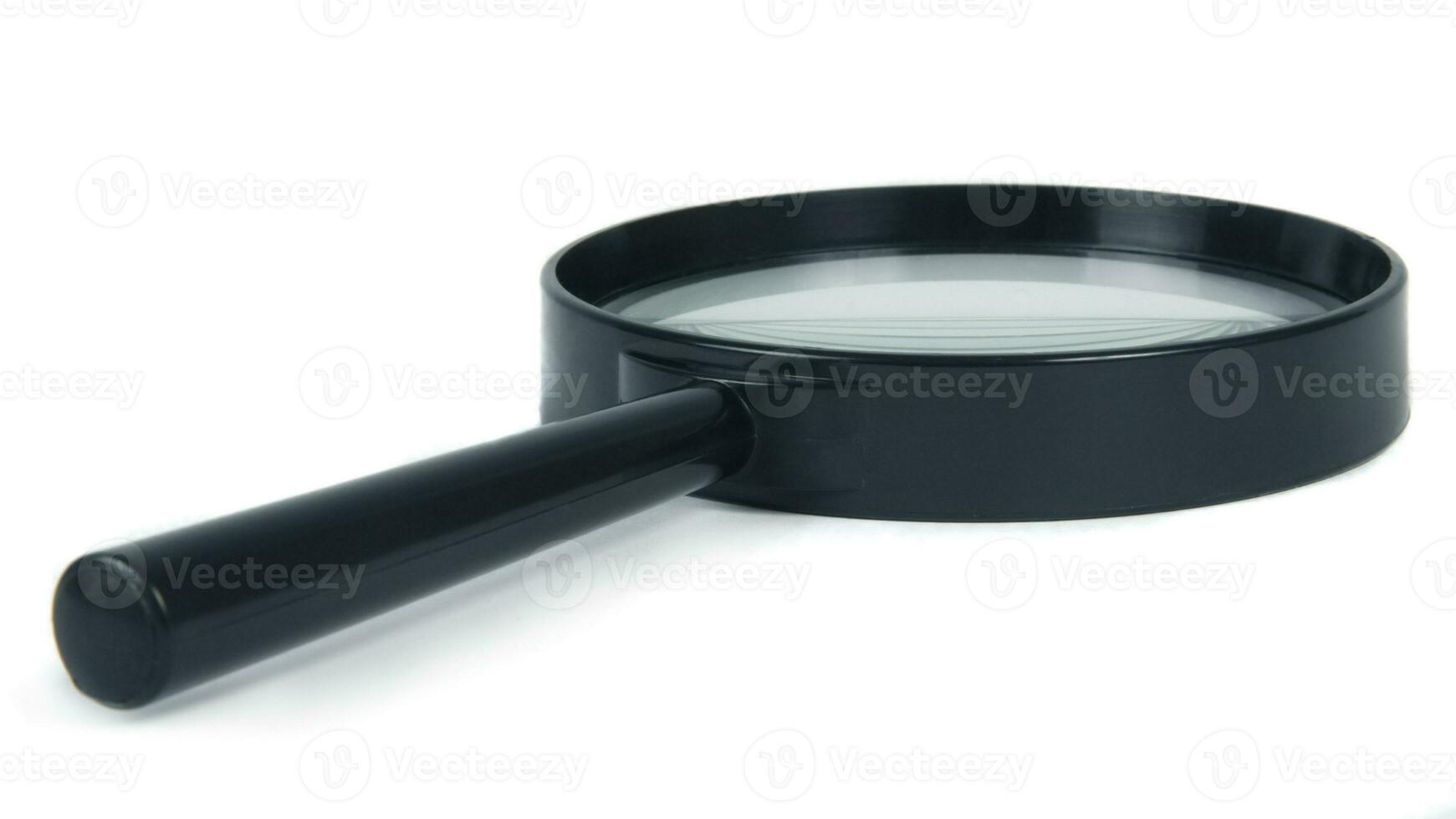 magnifying glass on white photo
