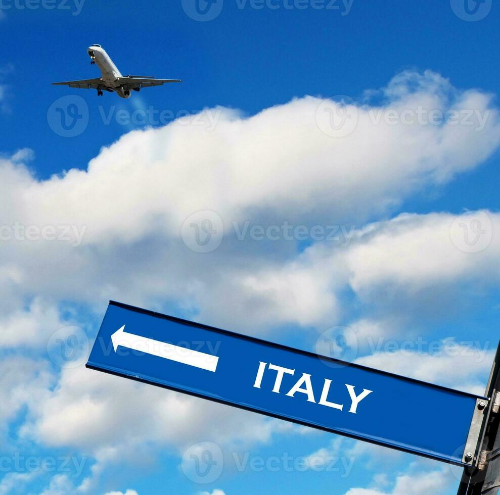 travel sign on sky photo