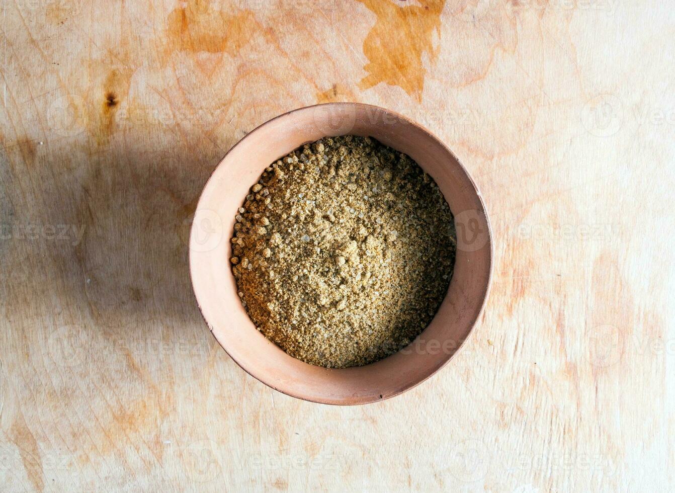 Spices in the bowls closeup on table photo