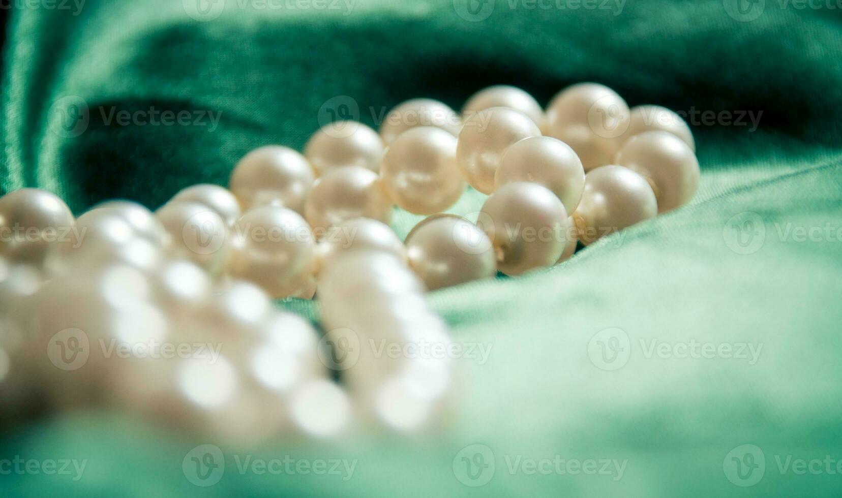 Pearls closeup on the silk photo